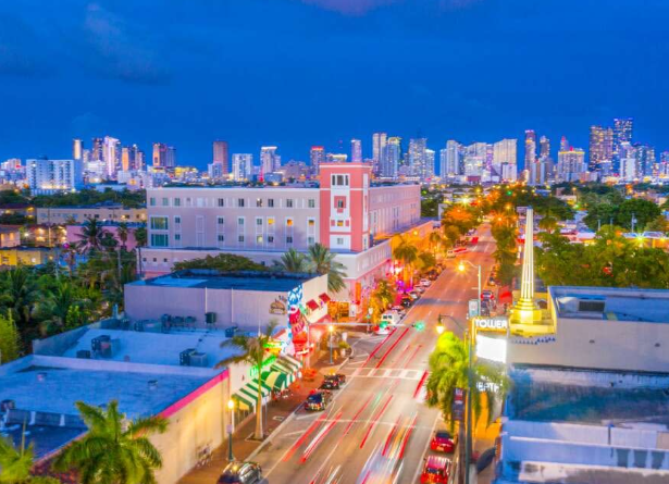 Evening aerial view of Calle Ocho and the Miami skyline